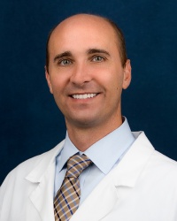 Dr. Justin Kuhns Spooner, MD